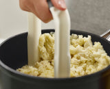 Side profile of the Easy-Mash masher showing the non-slip grip.