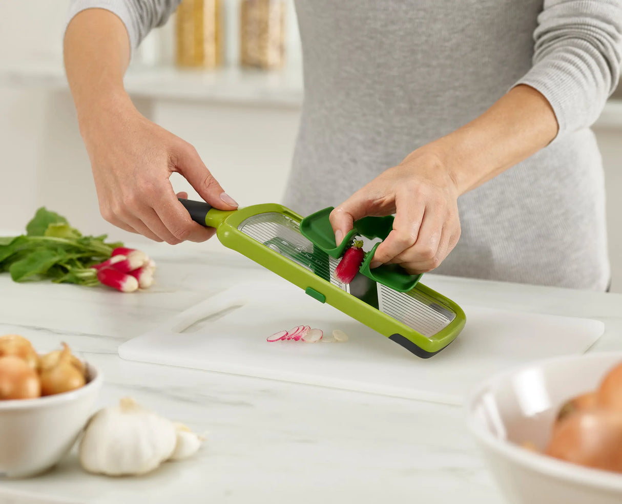 The precision food grip holding a vegetable in the centre grip position.