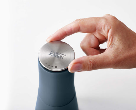 Joseph Joseph Milltop salt and pepper mills on a dining table