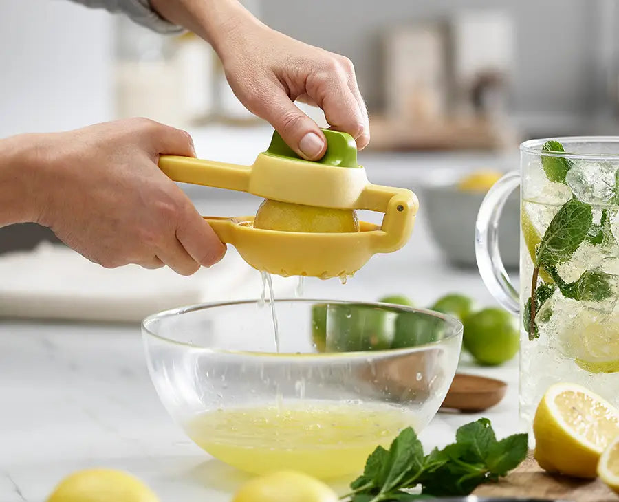 JuiceMax press open, showing the easy-twist reamer inside.