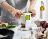 ChopCup with the lid lifted to show the stainless-steel blades.