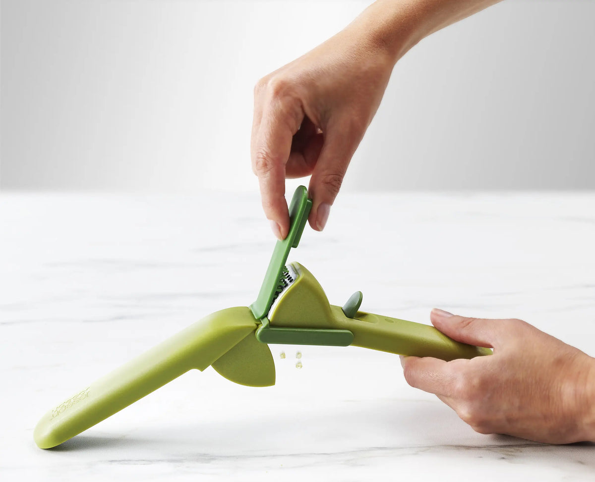 The cleaning tool being removed from inside the CleanForce handle.
