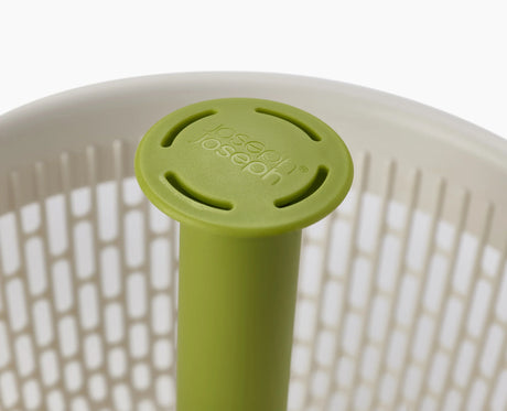 Joseph Joseph Spindola colander basket, spindle and suction cup dismantled