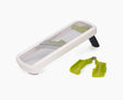 Joseph Joseph Multi-Grip Mandoline Plus in white, set up for slicing.