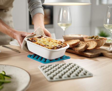 Joseph Joseph Duo silicone trivets set of two in opal and stone single trivet in use, Homelux Kenya