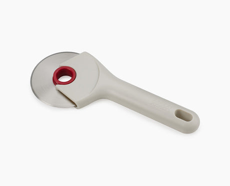 Joseph Joseph Ringo pizza cutter in stone and red, sold in Kenya by Homelux Kenya
