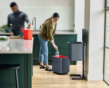 The 3-litre removable food waste caddy lifted out of the Totem Max.