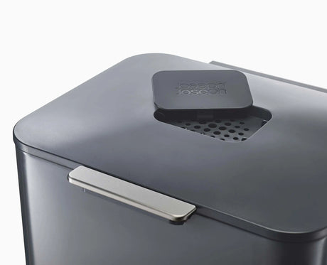 Close-up of the activated carbon odour filter in the Totem Max lid.