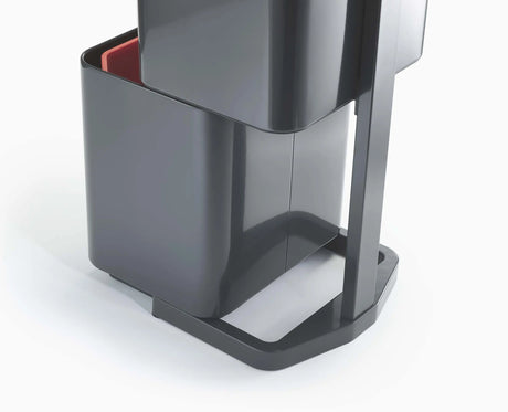Carrier bag hooks and liner retaining holes inside a Totem Max compartment.