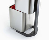 Liner retaining holes and carrier bag hooks inside a Totem Compact compartment, stainless steel