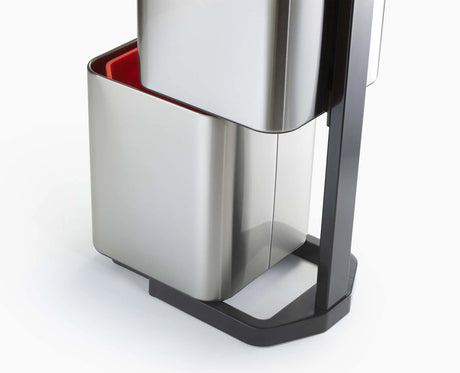 Liner retaining holes and carrier bag hooks inside a Totem Compact compartment, stainless steel