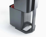 Liner retaining holes and carrier bag hooks inside a Totem Compact compartment, graphite