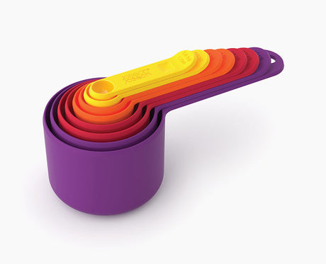 Joseph Joseph Nest Measure eight-piece measuring cup and spoon set in multicolour.