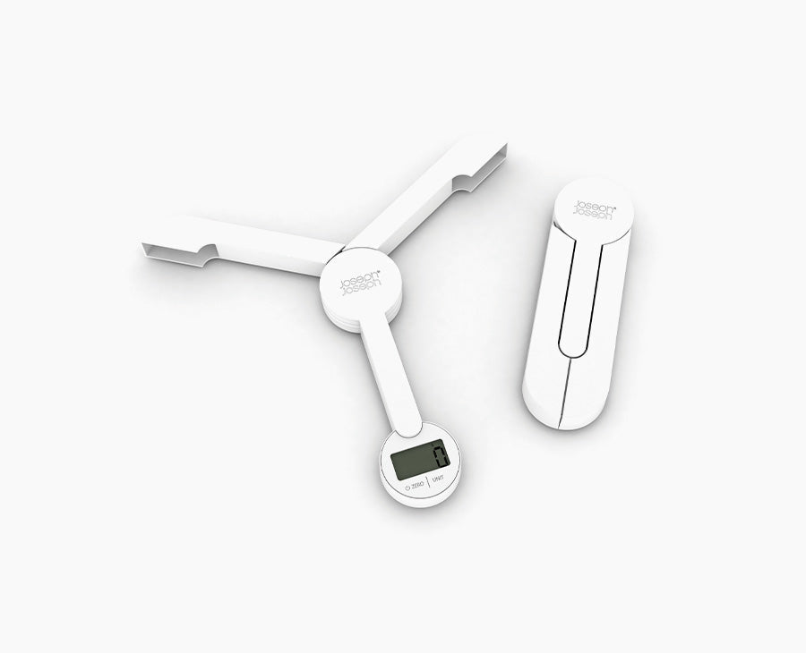 Joseph Joseph TriScale digital kitchen scale in white with its three arms opened out