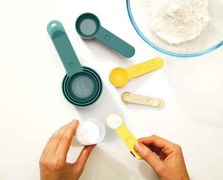 Close-up of the snap-together handles that hold the measuring cups as a single set