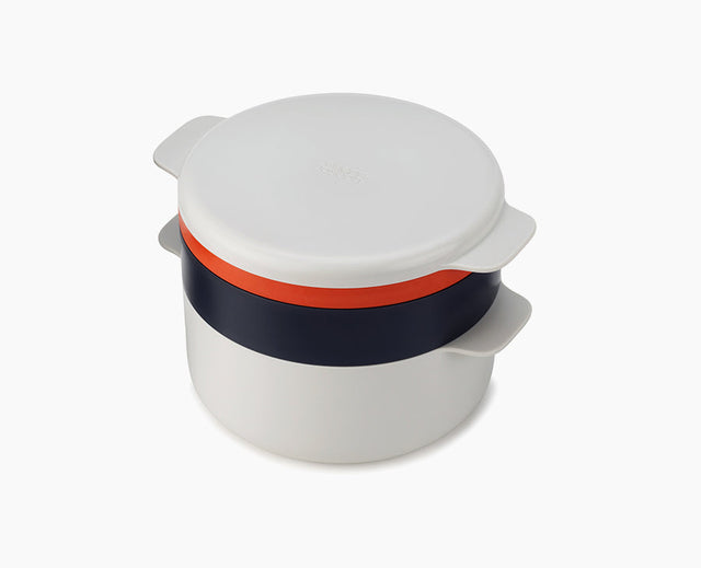Joseph Joseph M-Cuisine 4-piece microwave cooking set stacked together in stone and orange