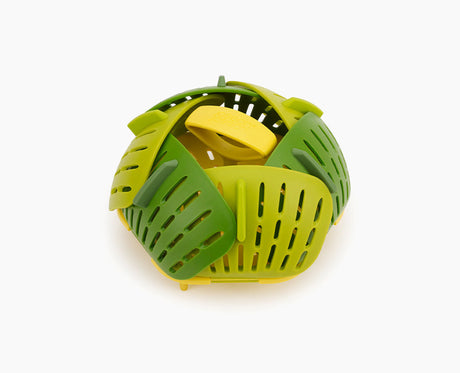 Joseph Joseph Bloom folding steamer basket in green, opened out flat