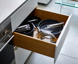 The same 28cm pan with its stainless-steel handle folded down against the body