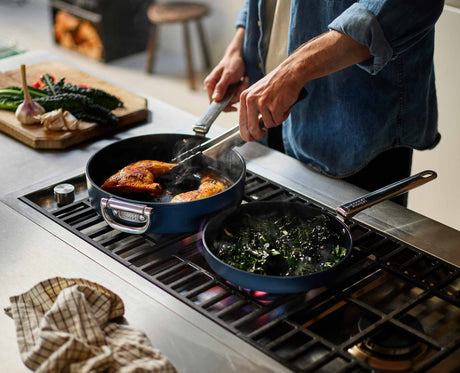 The Space frying pan in use on a hob in a modern kitchen