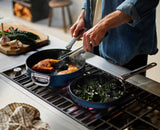 The Space pans in use on a hob in a modern kitchen