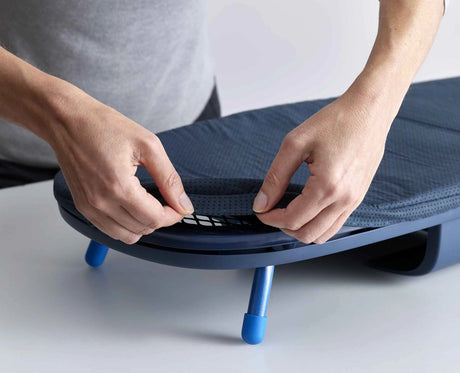 Detail of the DripLock waterproof cover surface on the ironing board.