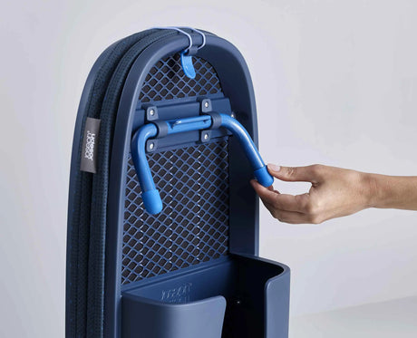 The folded Pocket Plus board hanging from its wall hook.