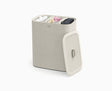 Joseph Joseph Tota Trio 90L laundry basket in ecru with the lid in place.