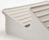 Close-up of the ridged surface that stops shoes slipping forward.