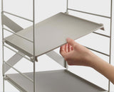 The ecru Level shoe rack standing inside a wardrobe base.