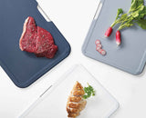 The Nest Boards stand on a kitchen worktop with the boards drying apart.