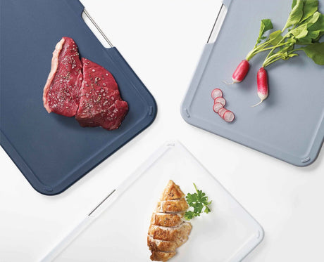 The Nest Boards stand on a kitchen worktop with the boards drying apart.