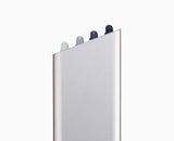 Overhead shot of a Folio board in use with chopped ingredients.