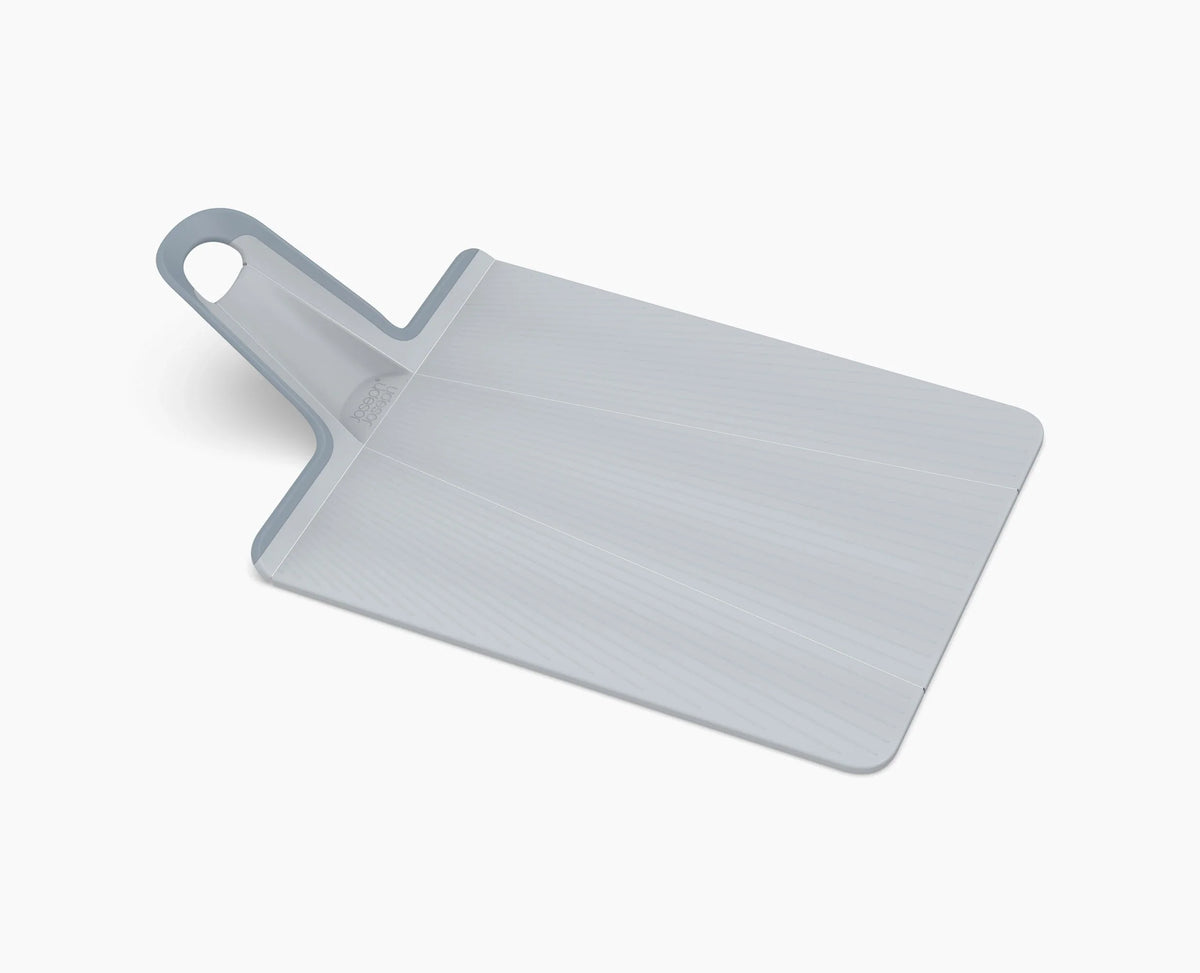 Close-up of the soft-grip handle on the Chop2Pot Plus board.