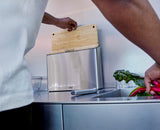 Close-up of the stainless-steel selection bars on the tops of the bamboo boards.