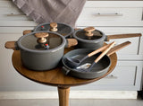 MGC Crocodile grey cookware set on a kitchen table
