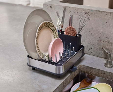 Joseph Joseph Extend Slim Steel dish rack loaded with plates and cutlery, Homelux Kenya