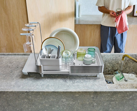 Joseph Joseph Extend Steel Plus expandable dish rack in stone wine glass rail in use, Homelux Kenya