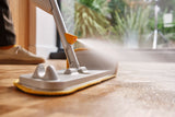 The mop head flipped over to show the spot-cleaning scrubber pad.