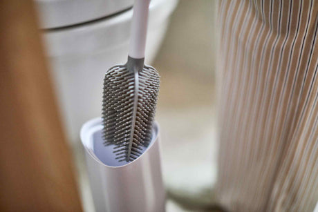 Joseph Joseph Flex 360 toilet brush cleaning inside a toilet bowl, Homelux Kenya