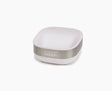 Joseph Joseph Slim compact stainless-steel soap dish in white, holding a bar of soap.