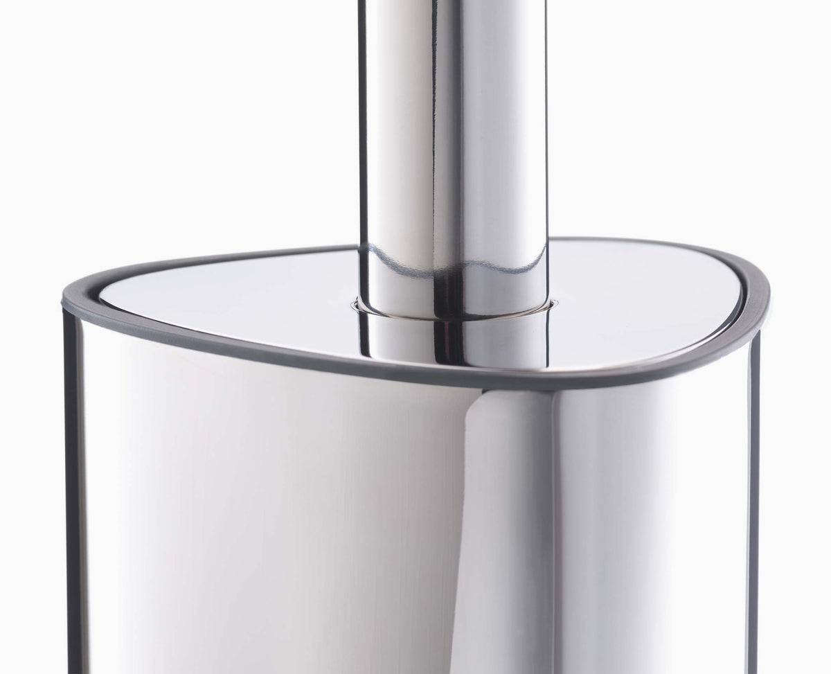 Joseph Joseph Flex 360 Luxe toilet brush with stainless steel holder brush in holder beside a toilet, Homelux Kenya