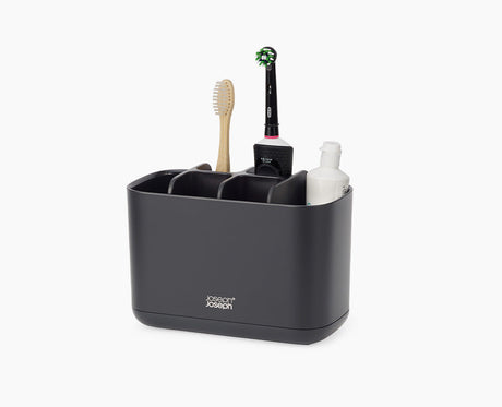 Joseph Joseph EasyStore large toothbrush holder in matt black, filled with brushes.