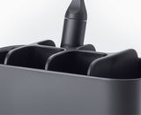 Close-up of the ventilated base of the large toothbrush holder.