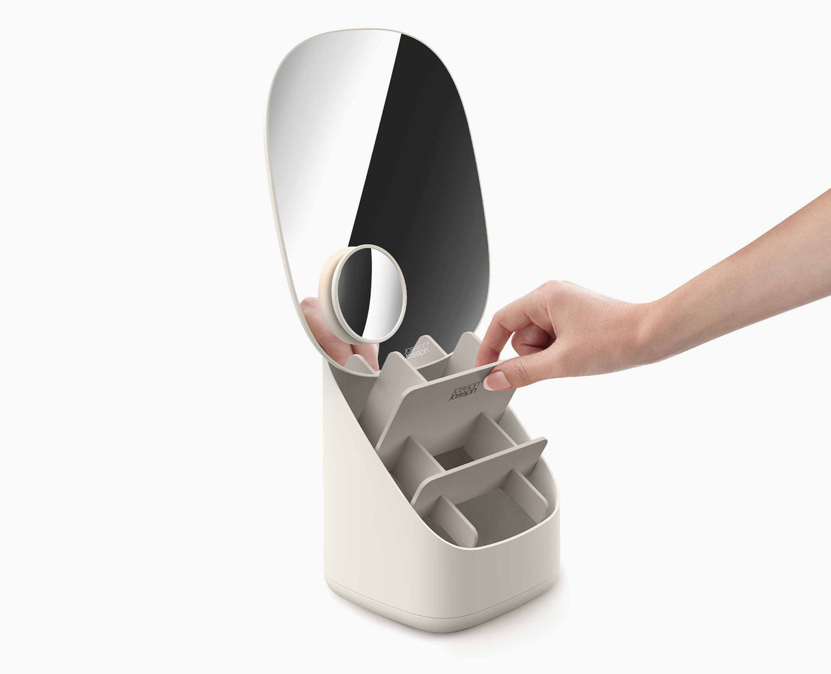 Close-up of the mirror face on its pedestal stand.
