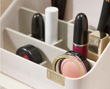 The shell-coloured organiser on a dressing table with cosmetics.