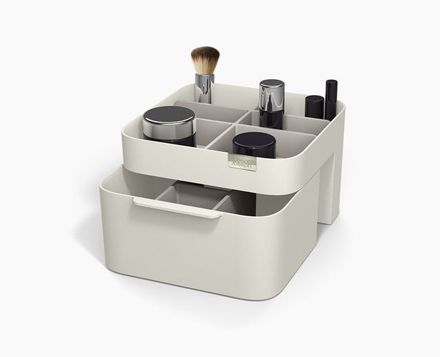 Joseph Joseph Viva cosmetic organiser in Shell shown from the front with the drawer closed.