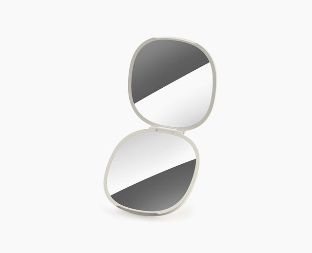 Joseph Joseph Viva 2-in-1 compact mirror in Shell, closed.