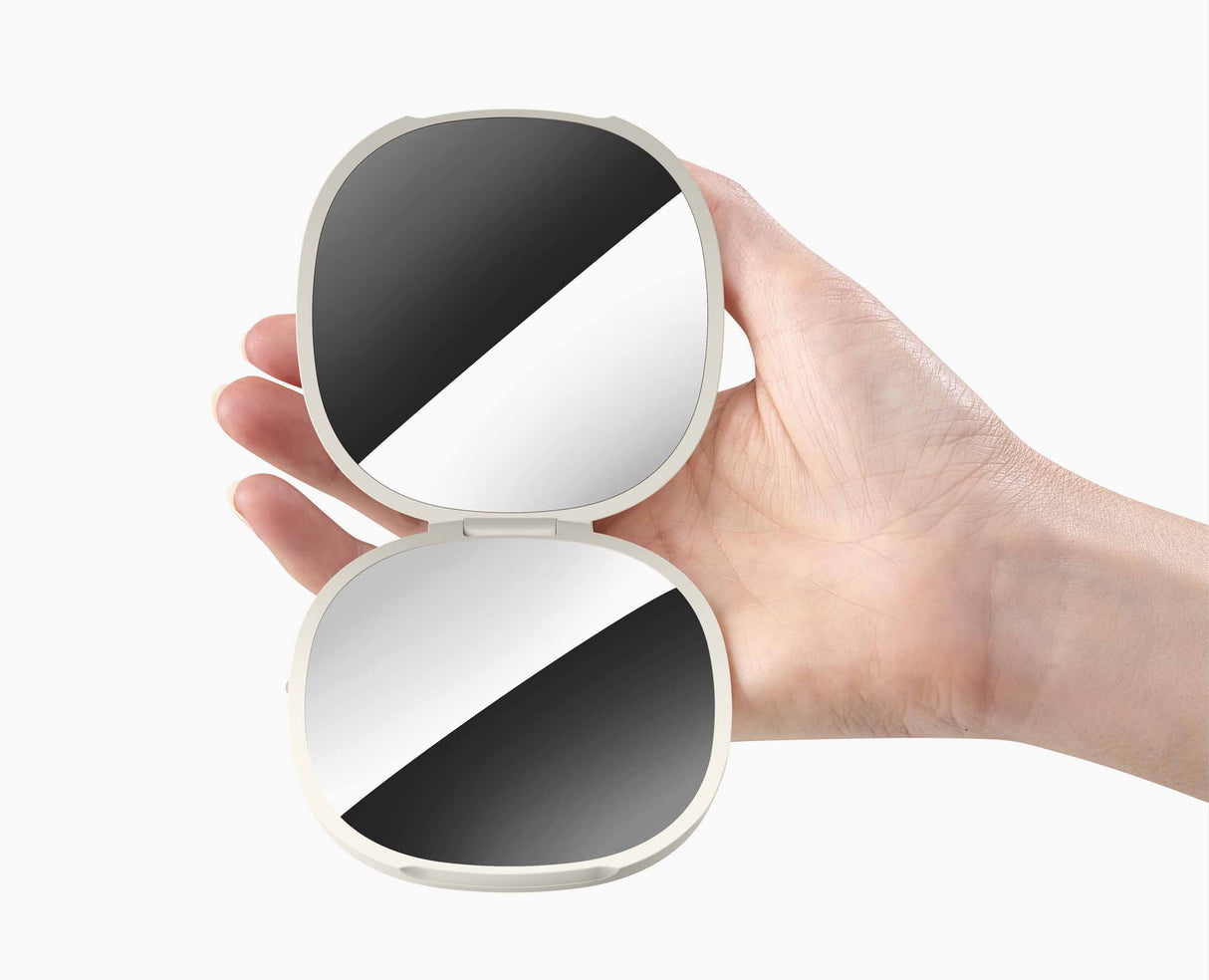 The soft silicone strap used as a finger loop to hold the mirror securely.