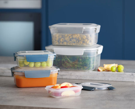 The blue containers nested inside one another as one compact block.