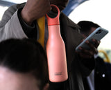 Detail of the storage loop holding the bottle cap while drinking.
